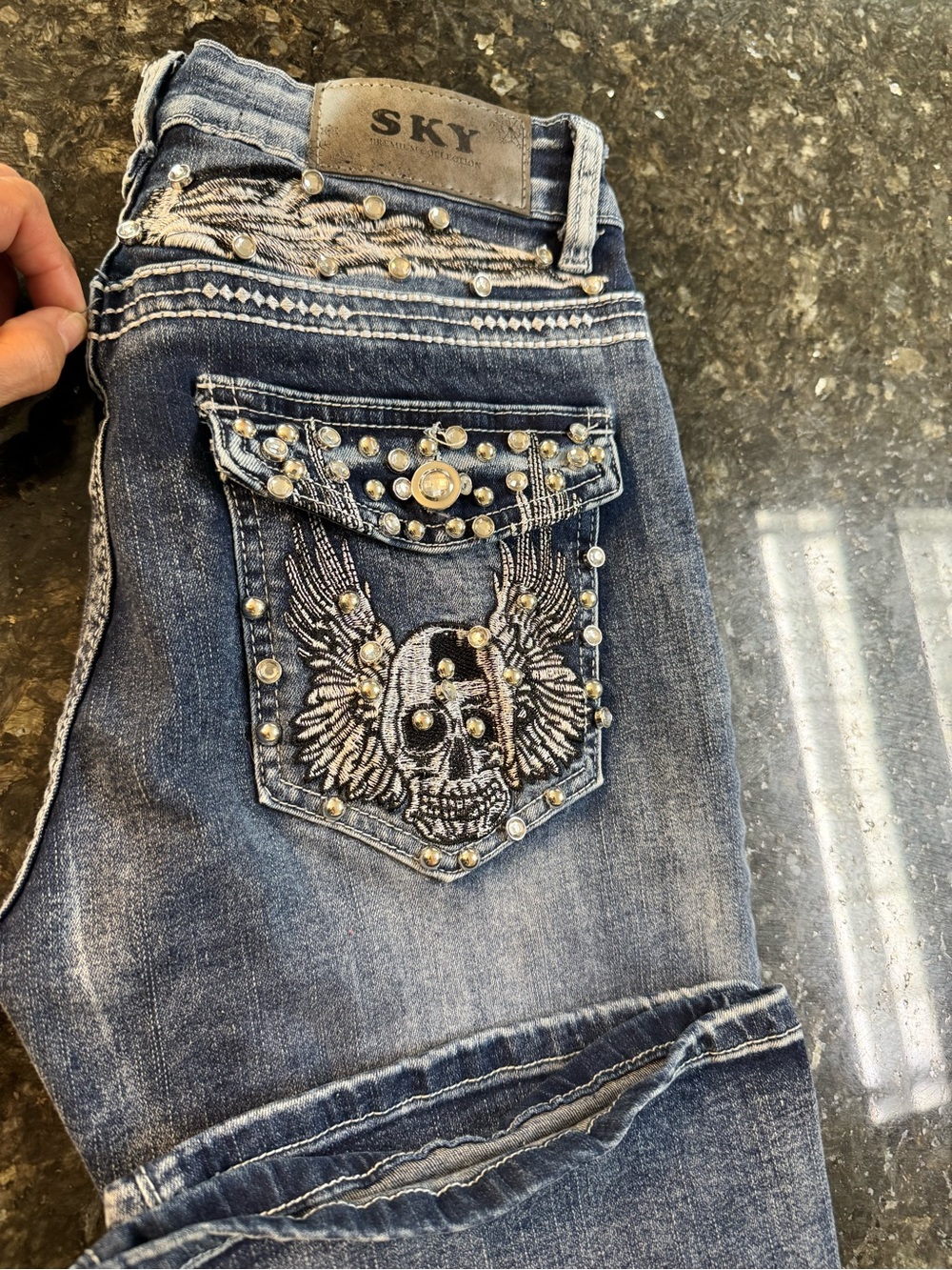 Sky Embellished Winged Skull Jeans - Distressed Blue Wash